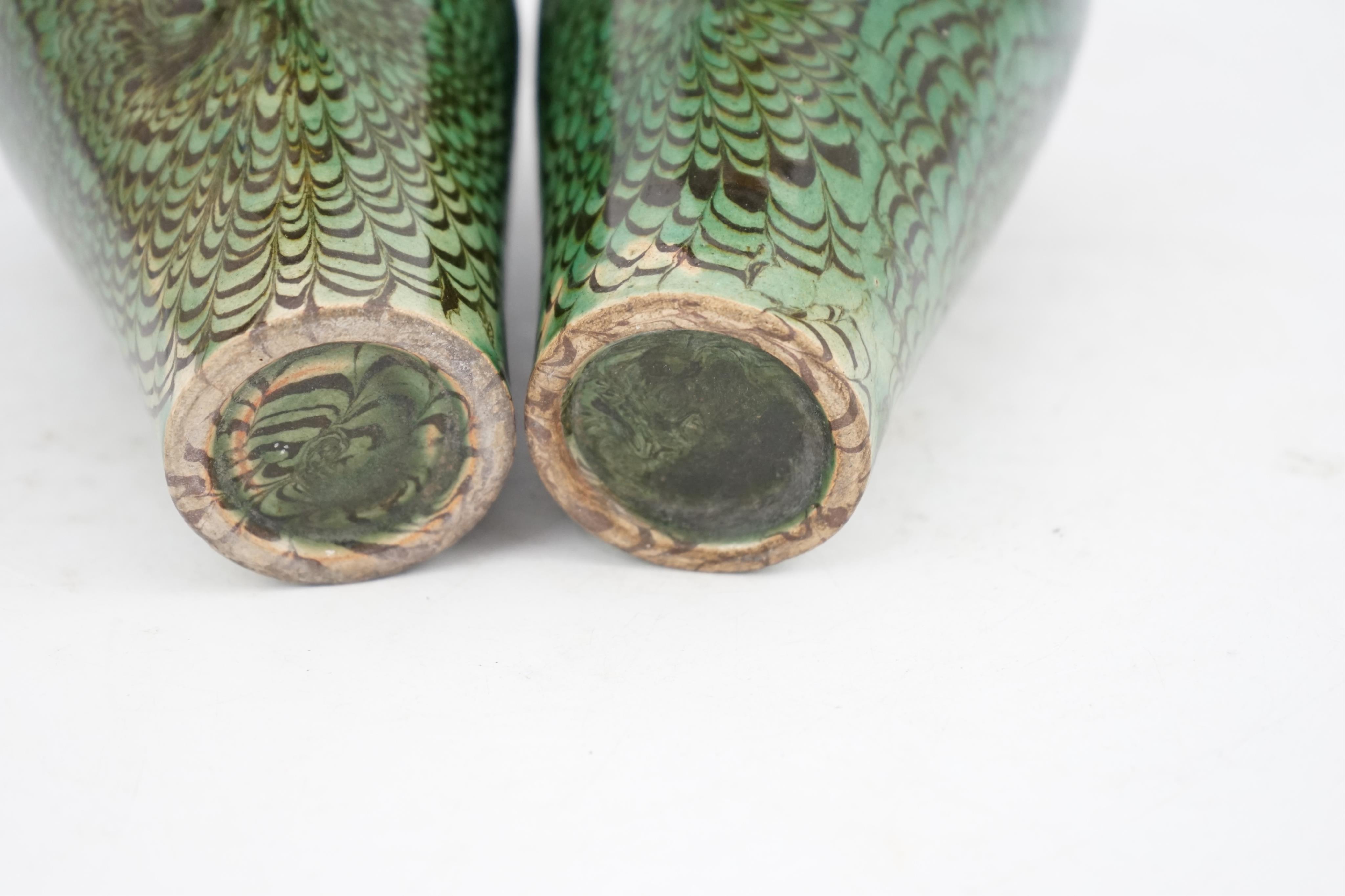 A pair of Chinese Cizhou green glazed meiping, probably Ming dynasty